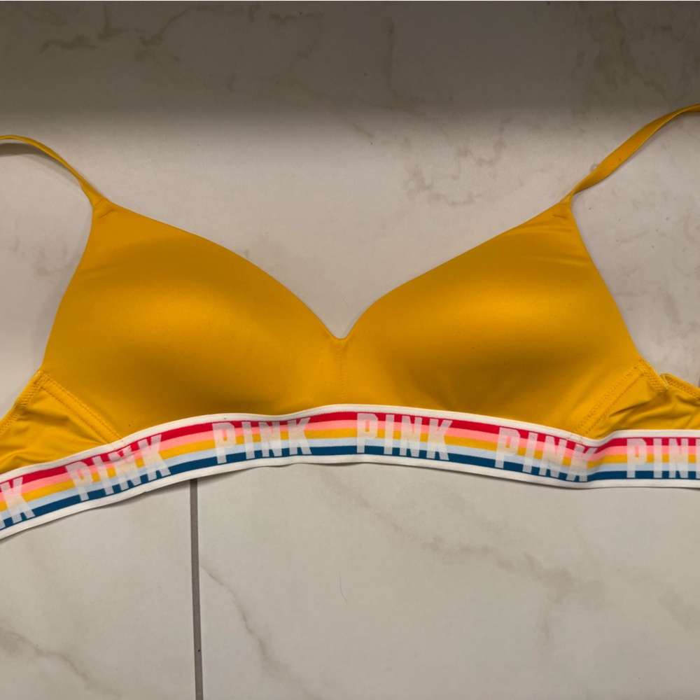 Victoria’s Secret yellow bra with rainbow band